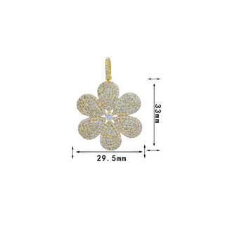 Gold flower-shaped pendant with gemstones and measurement details on a white background