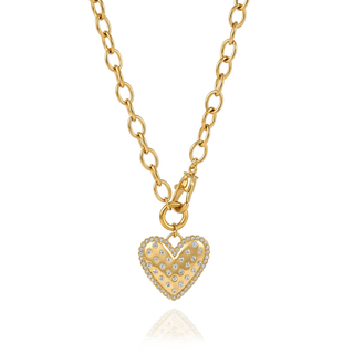 Chunky gold Clara Heart Clasp Necklace with sparkling pavé heart pendant and oversized heart lobster clasp front closure