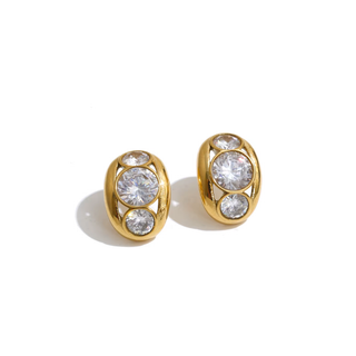 A pair of gold studs 
