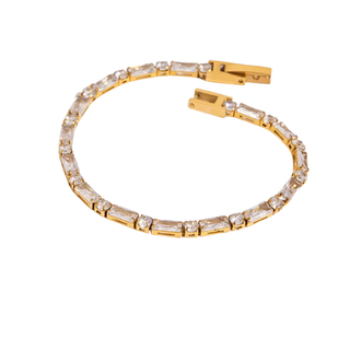 Victoria Tennis Bracelet in 18K gold with baguette and round crystal accents, polished finish, and secure clasp closure