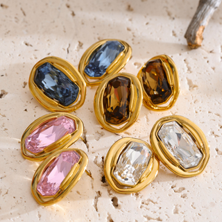 Polished gold Gemstone Frame Stud Earrings with faceted rectangular stone center in Clear and London Blue colors