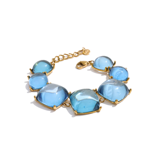 Ellis Statement Bracelet with oversized translucent blue stones in gold-tone prong settings