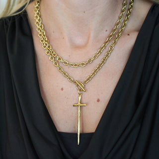 Elongated Cross Wrap Necklace gold with 18K gold-plated chain and elongated cross pendant, versatile for long or layered wear