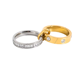 Avery Mixed Metal CZ Ring with polished gold and silver bands, featuring sparkling cubic zirconia stones