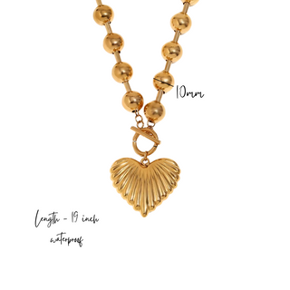 Beaded Heart Statement Necklace in gold-tone metal, with oversized spherical beads and a textured fan-shaped heart pendant