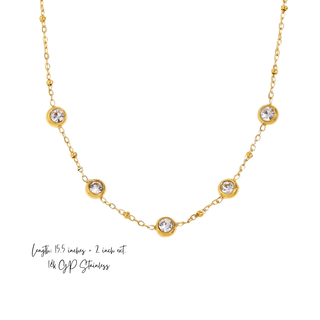 Bezeled Lilylight Necklace in gold-tone stainless steel with a delicate chain and five clear bezel-set stones