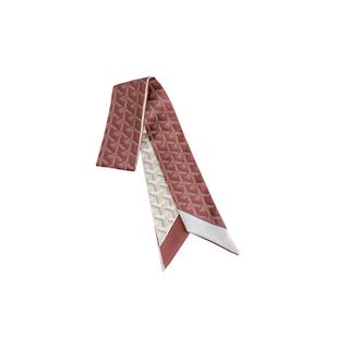 Brick Lane Twilly narrow scarf with a brick red and cream geometric print, showing its reversible double-sided design.