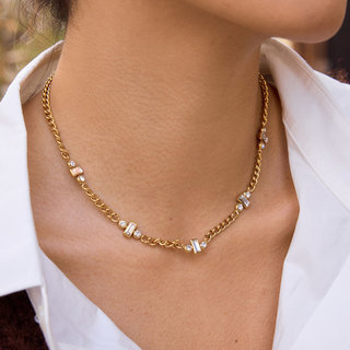Cannes triple Baguette CZ necklace in gold-tone curb chain with sparkling baguette and round stone clusters