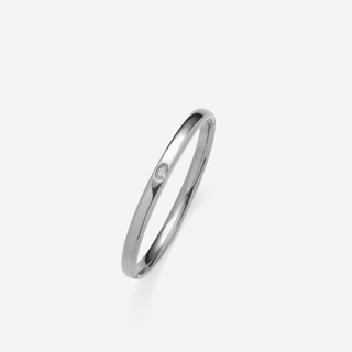 Center Stone Bangle Bracelet in polished silver-tone metal with a slim oval band and a single clear center stone
