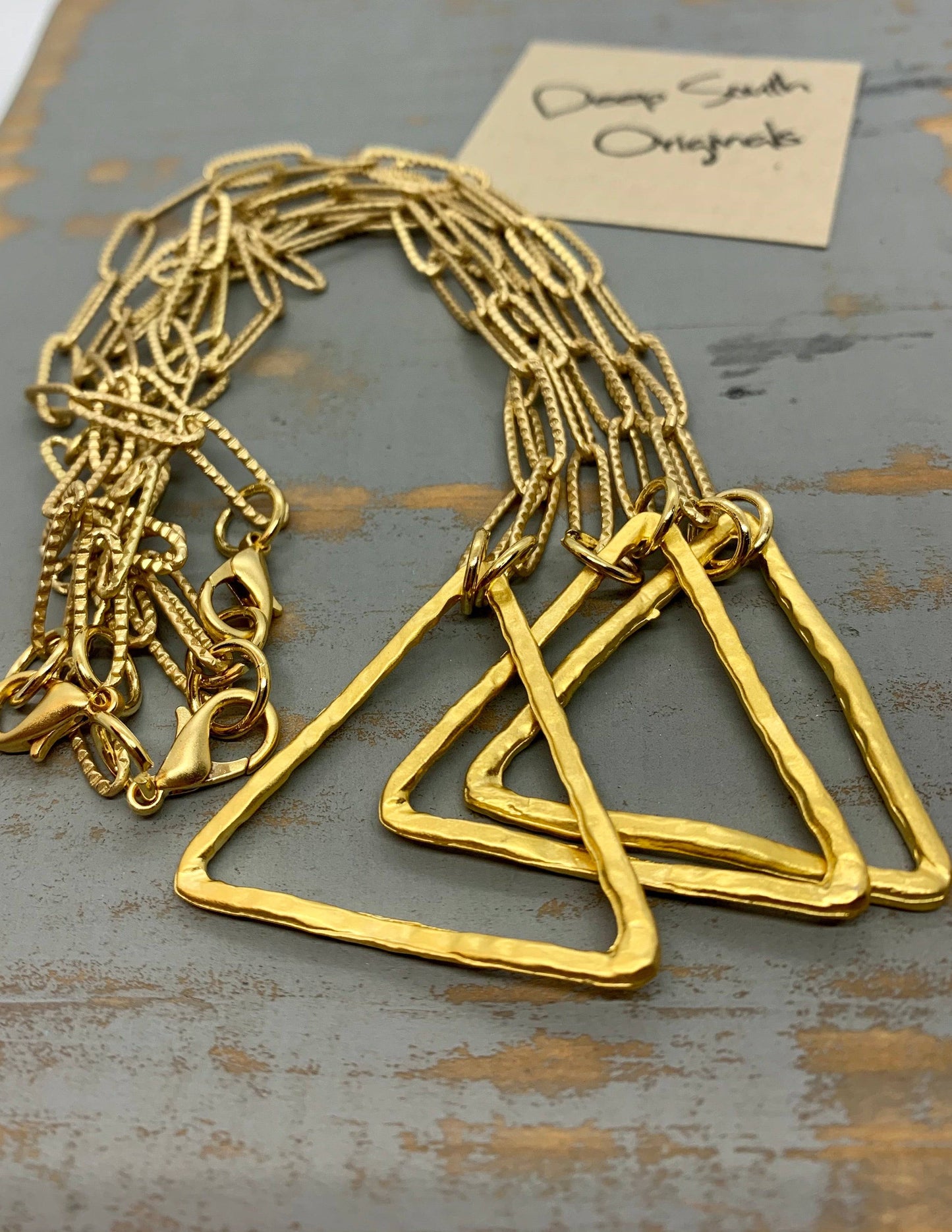 Hammered gold triangle necklace on etched elongated chain - Deep South Originals