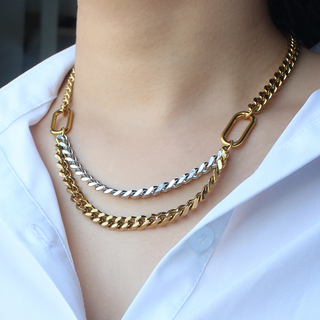 Duet Two Tone Chain Necklace with layered gold and silver curb links, featuring rectangular connectors and a bold mixed-metal design.