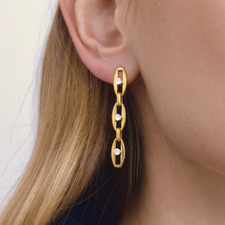 Elise CZ Link Drop Earrings in polished gold-tone metal, with three elongated links and clear sparkling stones