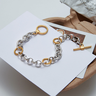 Elle Two-Tone Link bracelet with polished silver and gold-tone chunky links and a distinctive toggle clasp