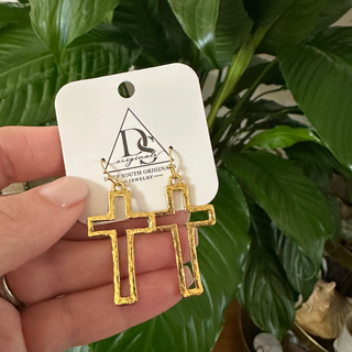 Faith Cross Earrings in textured gold-tone metal, featuring open cross-shaped dangles with a hammered finish