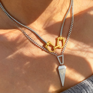 Geo Point Pendant necklace with a silver geometric point charm, pavé triangular detail, and mixed gold and silver chain links