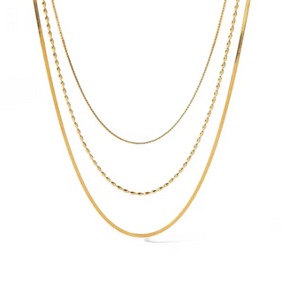 Golden Layers Triple Necklace in gold-tone metal with three delicate chains, including fine, oval-link and smooth layers.