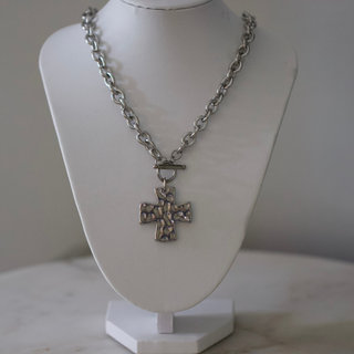 Hammered Cross Toggle necklace in silver stainless steel, with a chunky chain, textured cross pendant, and bar clasp