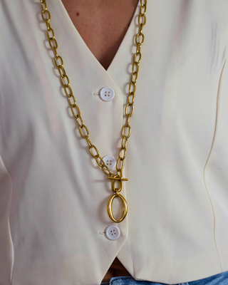 Harper Toggle Layered Necklace in gold-tone metal, featuring elongated oval links and a prominent toggle clasp with loop pendant