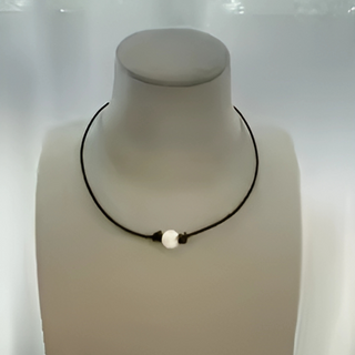 Hometown Pearl Choker in black leather with a single round white pearl centerpiece and small dark accents