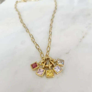 Kendall Birthstone Necklace with a fine gold-tone chain and five colorful square birthstone charms in gold bezels