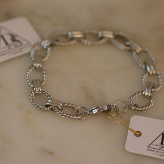 Laurel Link Bracelet in silver-tone metal with alternating polished oval and twisted rope-texture links and a clasp