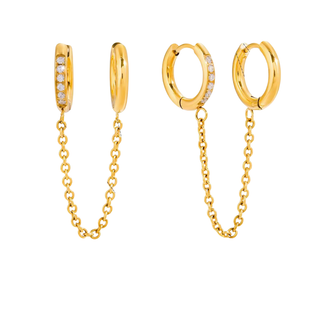 Linked Huggie Hoop Earrings in polished gold with a delicate connecting chain and sparkling stone accents on one hoop