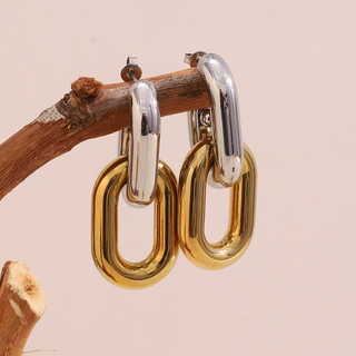 Linked Luxe Earrings in polished gold and silver-tone stainless steel, featuring bold interlocking chain links