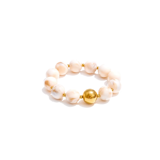 Mila Beaded Bracelet with pale peach and white marbled resin beads, gold-tone spacers, and a large gold bead