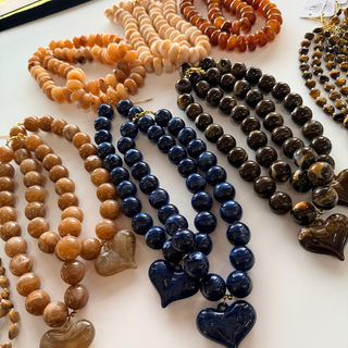 Millie Marbled Heart Necklace in glossy navy blue marbled resin, with chunky beads and a coordinating heart pendant