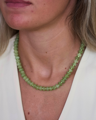 Olive Gemstone Necklace with small polished green stone beads in varied tones and a simple gold-tone clasp