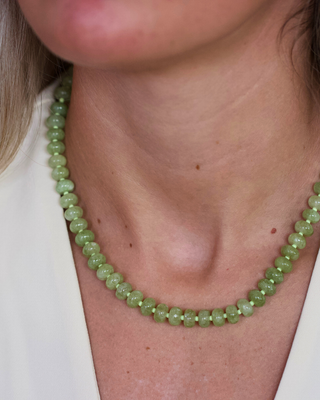 Olive Gemstone Necklace with small translucent olive-green round stone beads and a simple strand design