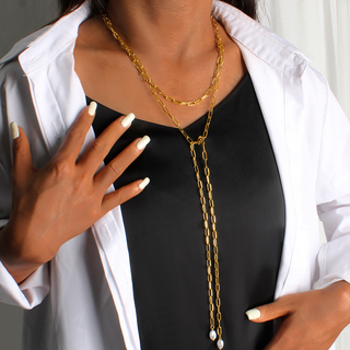 Paperclip Pearl Lariat necklace in gold-tone metal, with elongated chain links and two pearl drops at the ends