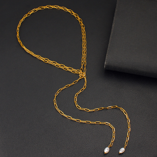 Paperclip Pearl Lariat necklace in gold-tone metal with an elongated link chain and two white pearl drops.