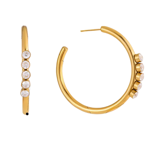 Portofino CZ hoop earrings in gold-tone metal, with five clear round stones set along slender open hoops.