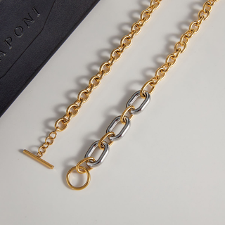 Riviera two-tone link toggle necklace with polished gold chain links, silver center links and a circular toggle clasp