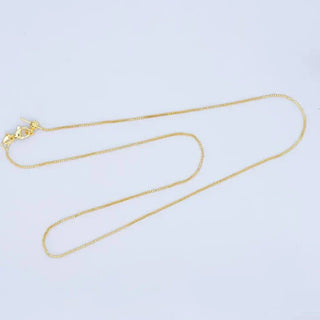 Close-up of a simple threader box chain necklace