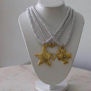 Silk Cord Pendant Necklace with white twisted cords and gold-tone star, heart, and cross pendants
