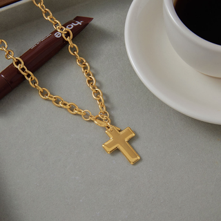 Solid Cross Toggle Necklace in gold-tone metal with a chunky oval-link chain and smooth, solid cross pendant