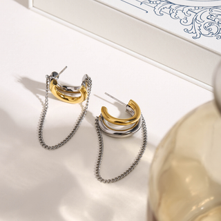 Talia Chain Hoop Earrings in polished mixed gold and silver stainless steel featuring a silver chain drop accent.