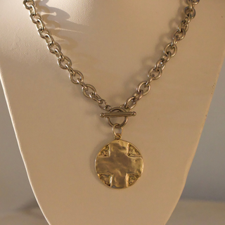The Lord's Prayer Cross Medallion necklace in gold-tone metal, with a chunky chain, toggle clasp and round cross pendant
