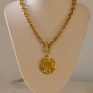 Gold The Lord's Prayer Cross Medallion necklace with a chunky link chain, toggle clasp, and round textured pendant