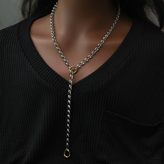 Two Tone Axis Necklace with silver-tone chain links, gold-tone connector and elongated drop chain with a looped end