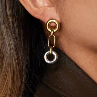 Two-Tone O Link Earrings in polished gold and silver metal, featuring interlocking circular and elongated links in a drop design