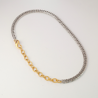 Urban Link Necklace with mixed silver and gold-tone links, combining a close-set chain with elongated oval links