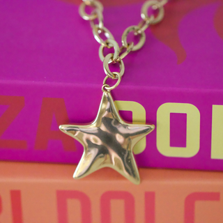 Wish Upon a Star Necklace with a polished gold-tone chain and shiny, sculpted five-point star pendant